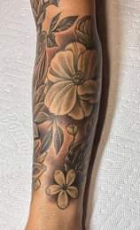 May be an image of one or more people and tattoo